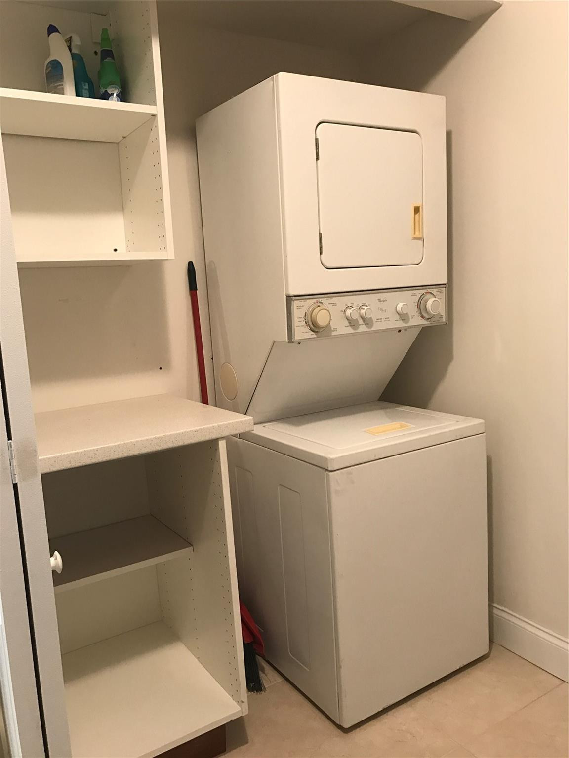 10053 Winding Lake Road, Unit 104 Sunrise, FL 33351 - Photo 6 of 44 a utility room with dryer and washer