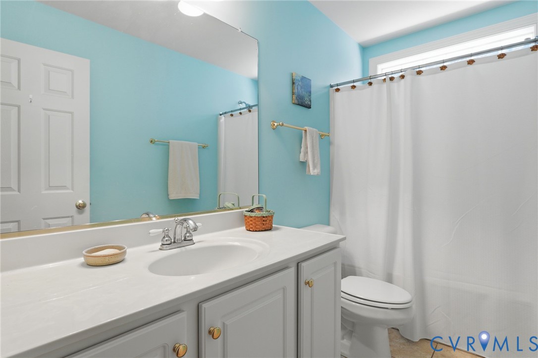 13424 Tipple Point Road Midlothian, VA 23114 - Photo 38 of 53 a bathroom with a sink and a mirror