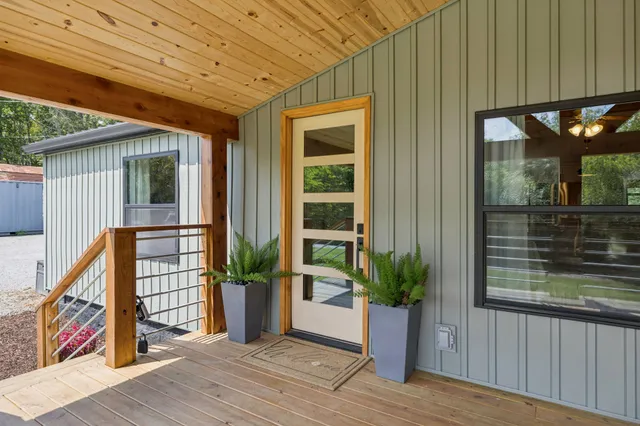 a kitchen with stainless steel appliances a sink stove and refrigerator