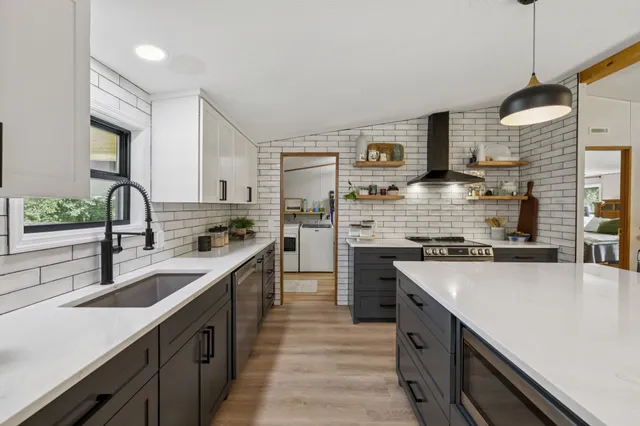 a view of bathroom with wooden floor