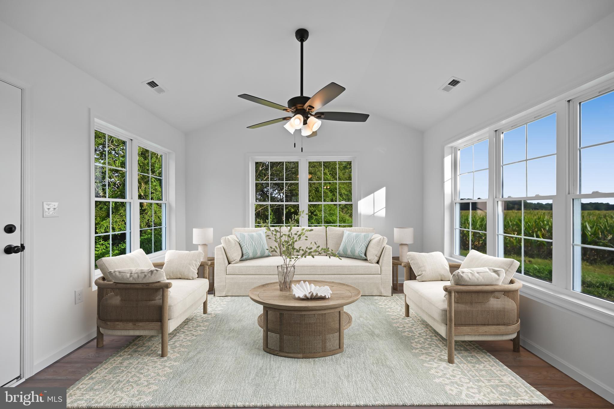 23180 Slaughter Neck Road Lincoln, DE 19960 - Photo 13 of 29 a living room with furniture and a large window