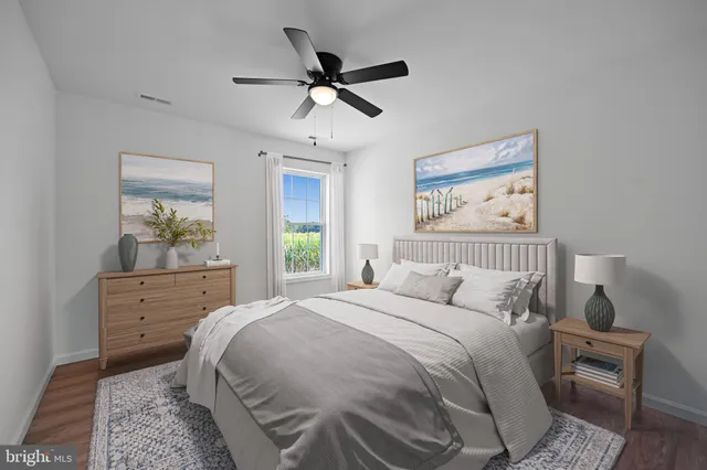 a bed room with a bed and a chandelier