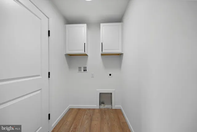 a view of small space with wooden floor