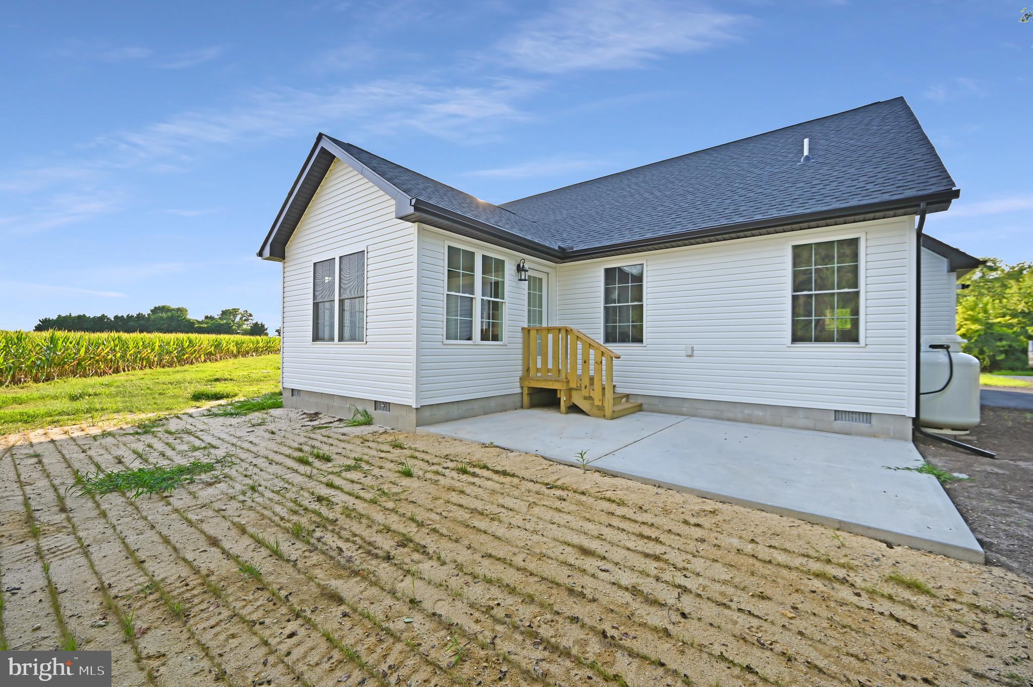 23180 Slaughter Neck Road Lincoln, DE 19960 - Photo 6 of 29 a view of a house with a yard