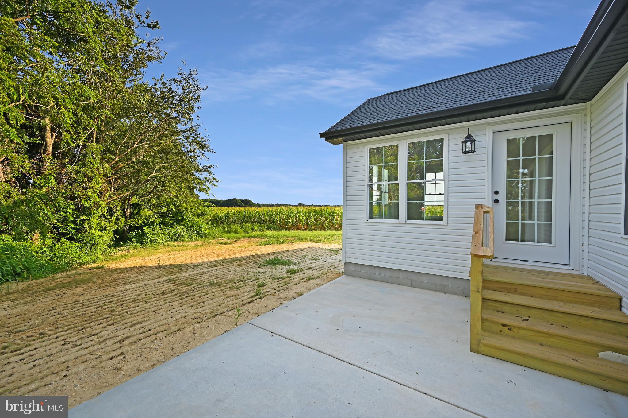 23180 Slaughter Neck Road Lincoln, DE 19960 - Photo 7 of 29 a view of a house with a yard