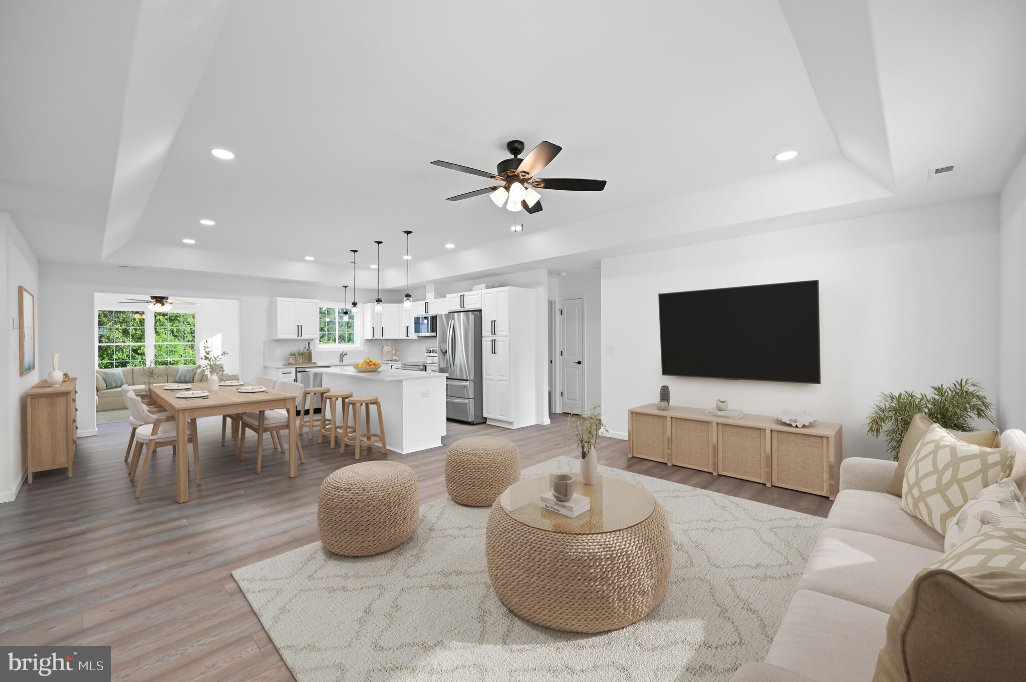 23180 Slaughter Neck Road Lincoln, DE 19960 - Photo 29 of 29 a living room with furniture and a flat screen tv