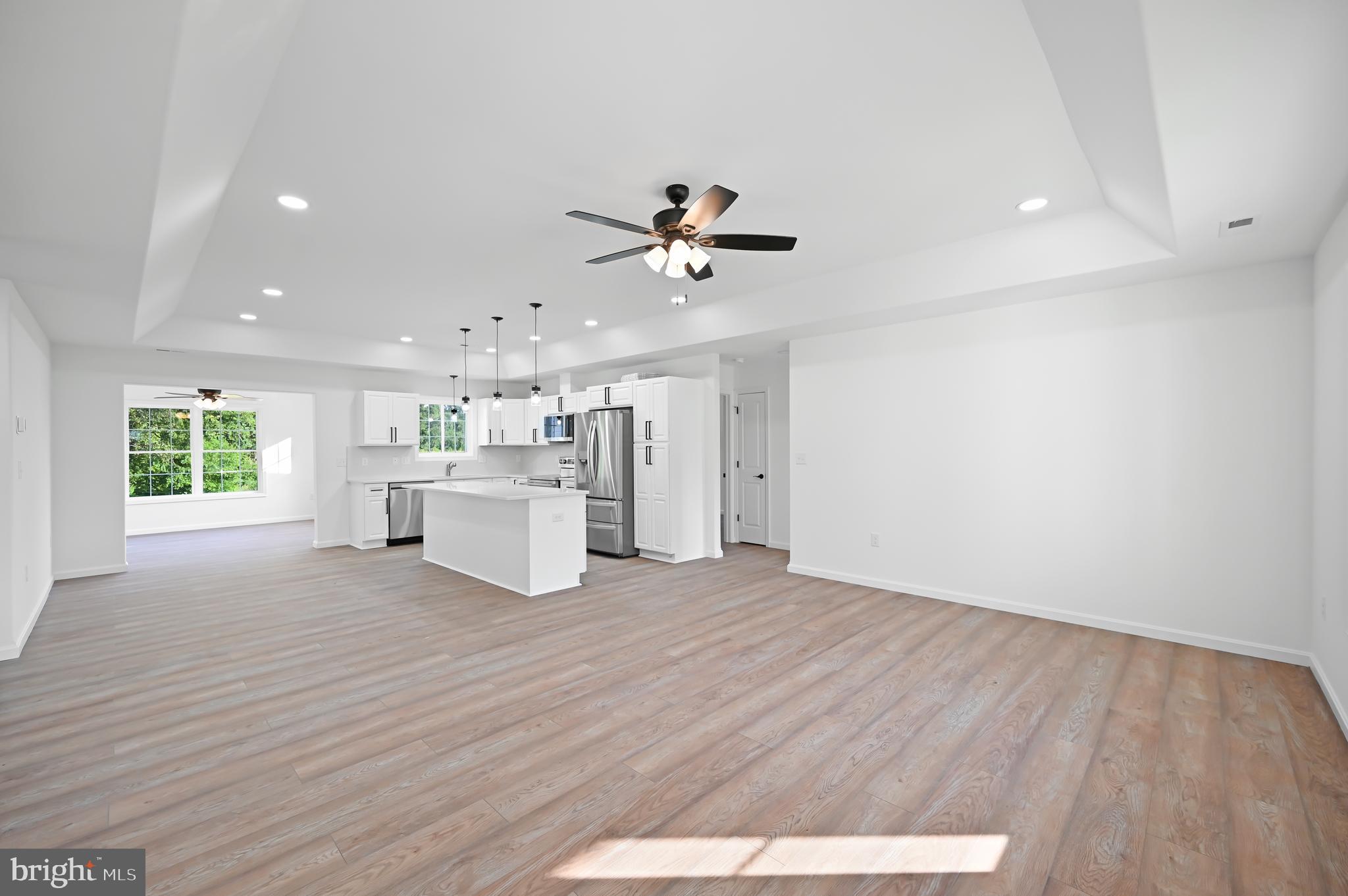 23180 Slaughter Neck Road Lincoln, DE 19960 - Photo 8 of 29 a view of a kitchen with a sink and a window