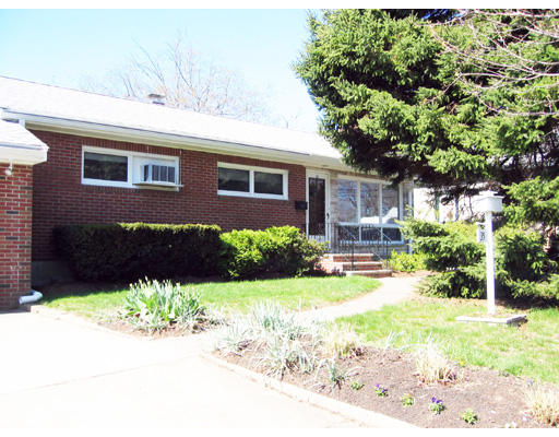 35 Bayview Road Marblehead, MA 01945 - Photo 1 of 1 a front view of a house with a yard and a garage