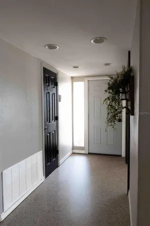 a view of a room with a hallway