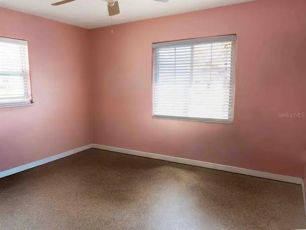 an empty room with a window