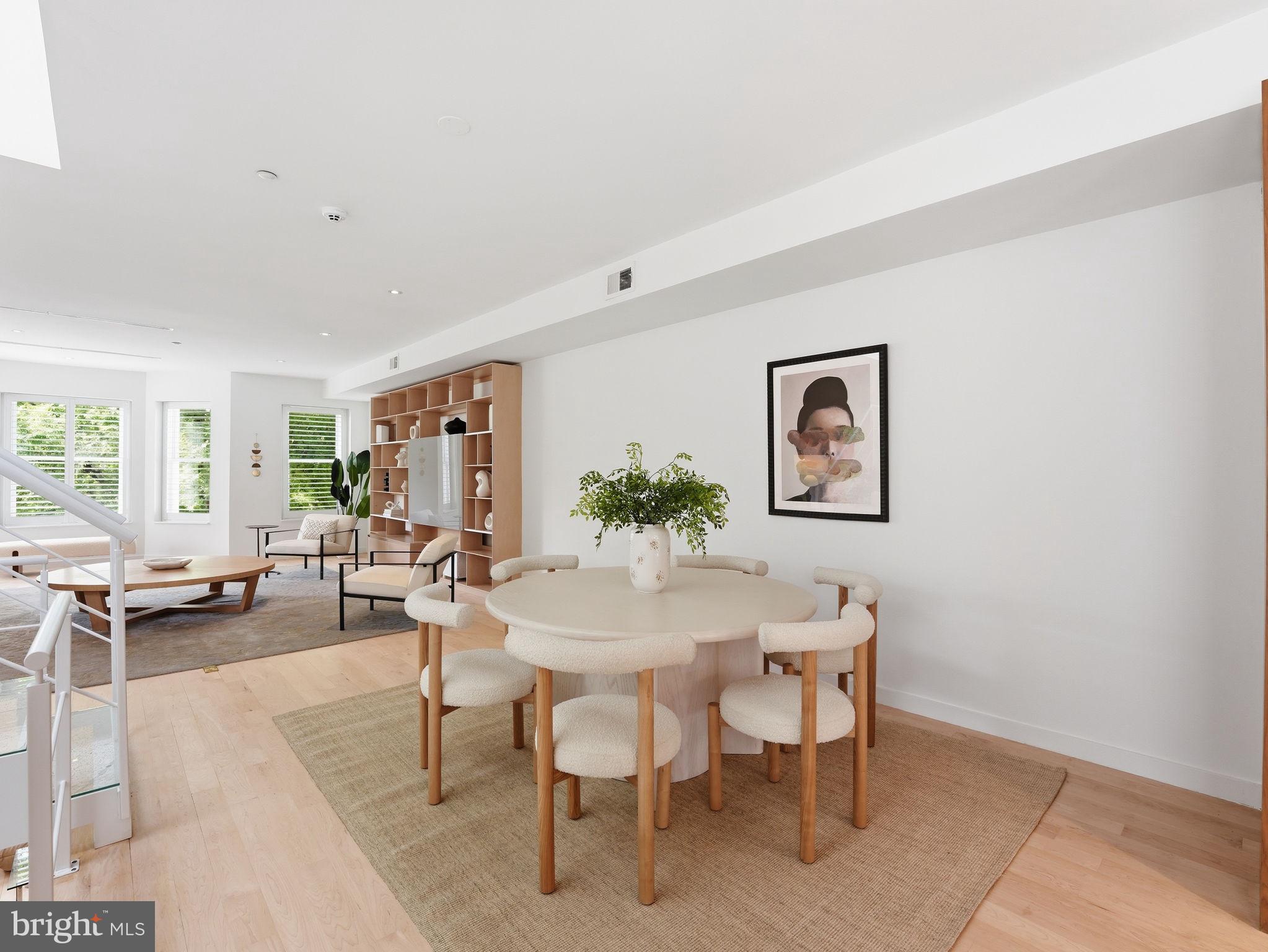 1845 Calvert Street Northwest Washington, DC 20009 - Photo 12 of 48 a view of a dining room with furniture