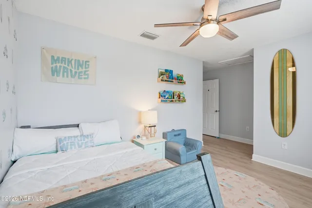 a view of a park with swings and slides