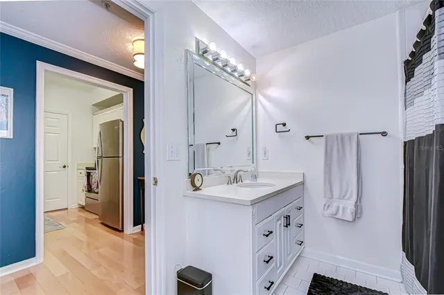 a view of a garage with parked cars