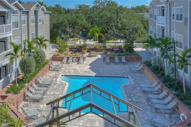 a kitchen with a sink and a stove top oven