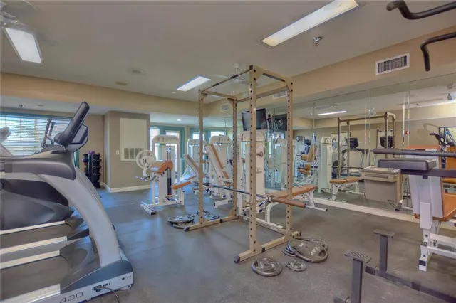 a house view with a seating space and a swimming pool