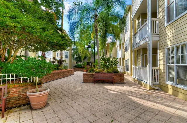 a view of a house with wooden deck