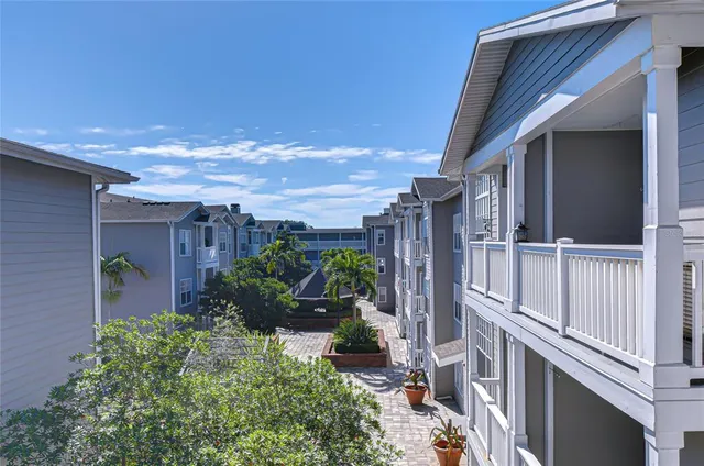 a view of a garage with parked cars