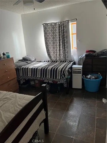 a view of a dining room with furniture and window