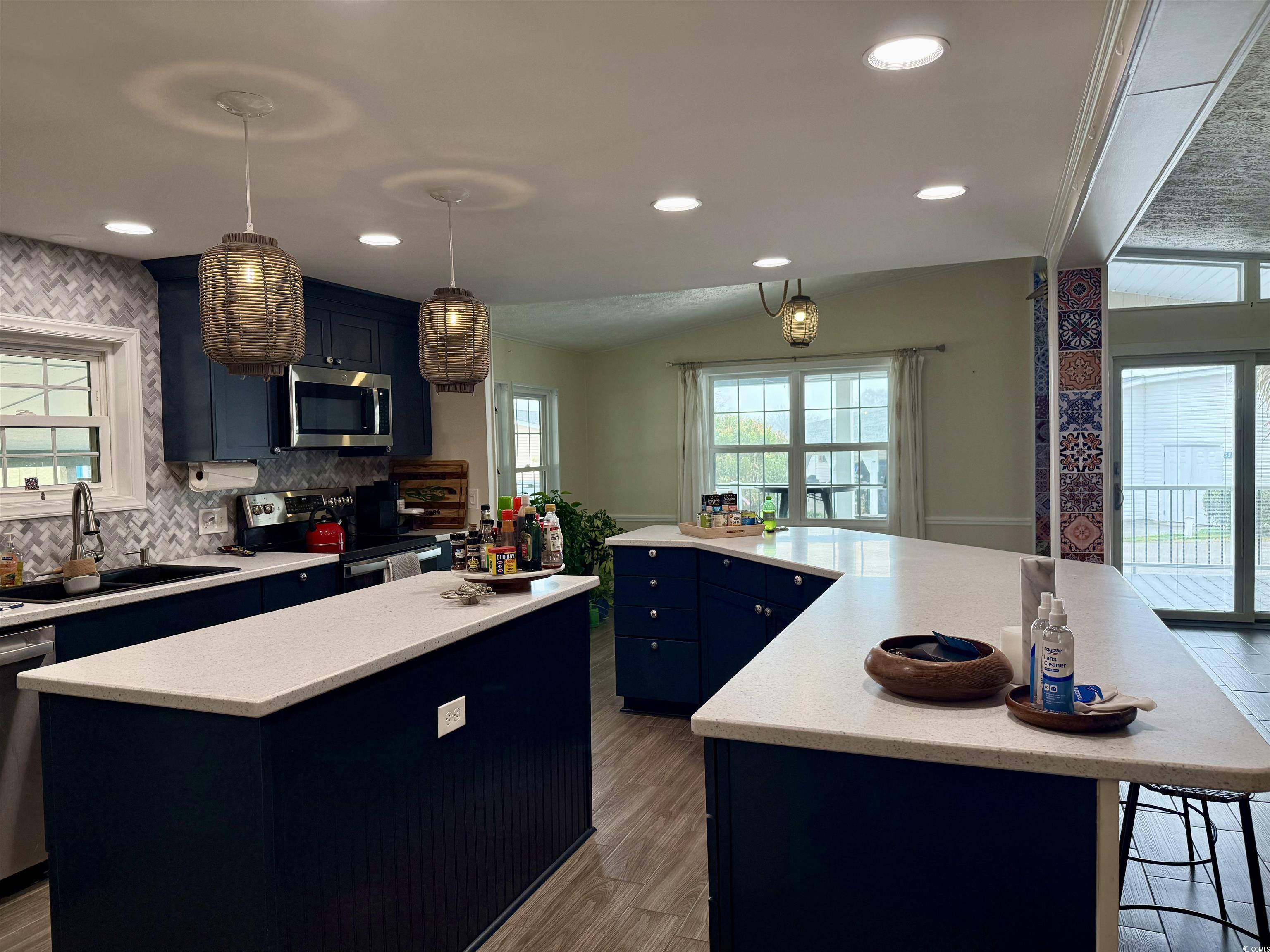 527 Sandpebble Surfside Beach, SC 29575 - Photo 19 of 31 Kitchen with sink, appliances with stainless steel