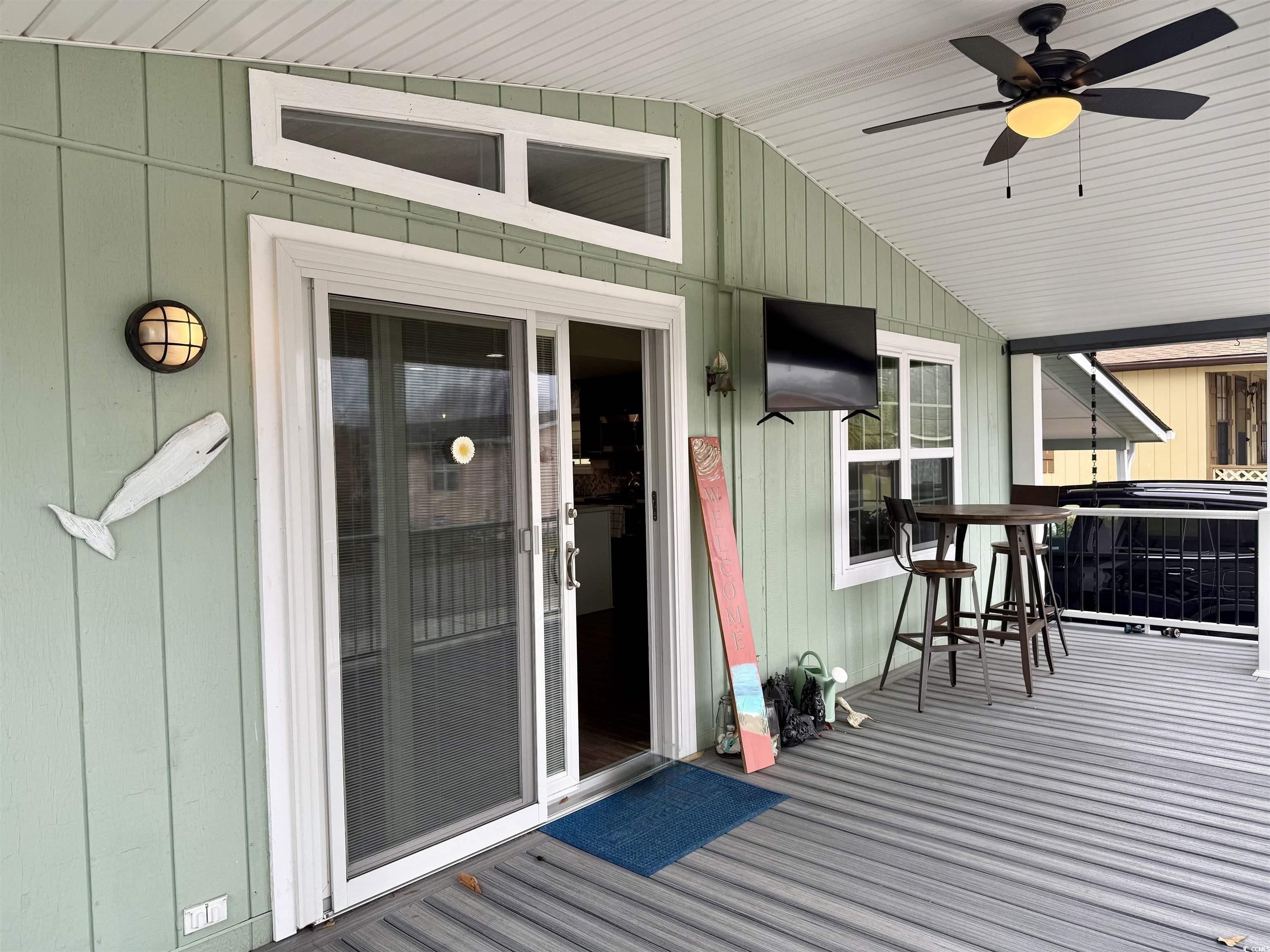 527 Sandpebble Surfside Beach, SC 29575 - Photo 3 of 31 View of wooden deck