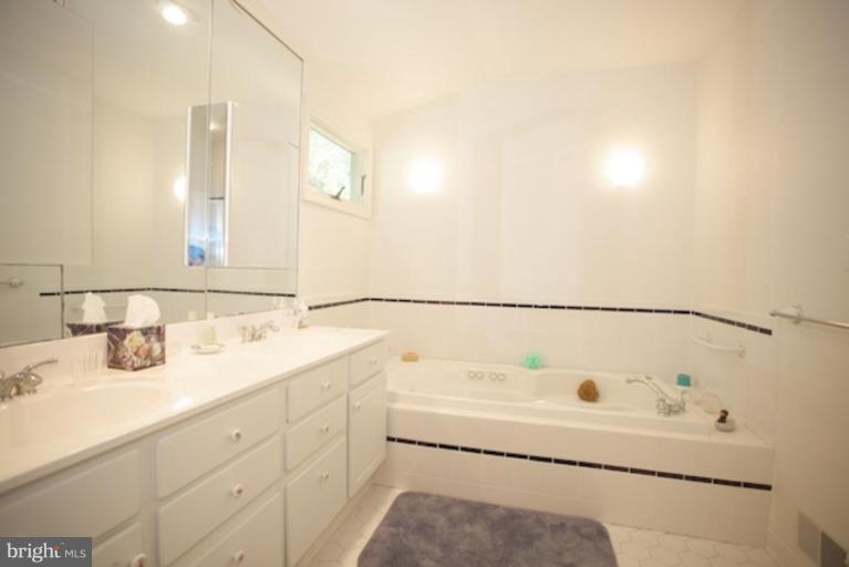 2057 Rockingham Street McLean, VA 22101 - Photo 9 of 14 a bathroom with a sink and a mirror