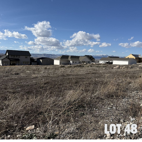 663 Cherry Ridge Lane, Unit 48 Richmond, UT 84333 - Photo 3 of 6 View of yard with a mountain view