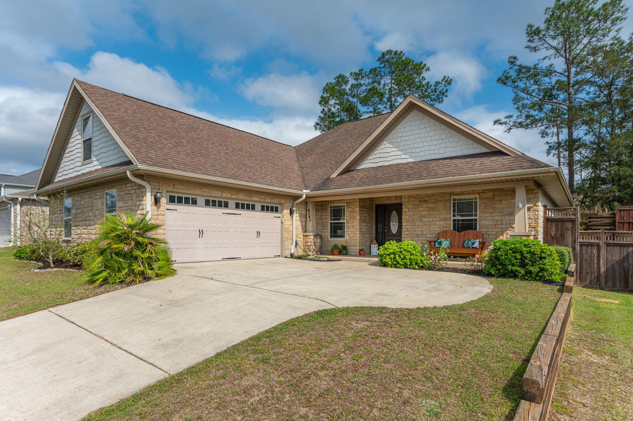 4545 Hermosa Road Crestview, FL 32539 - Photo 1 of 36 a view of a house with a yard and potted plants
