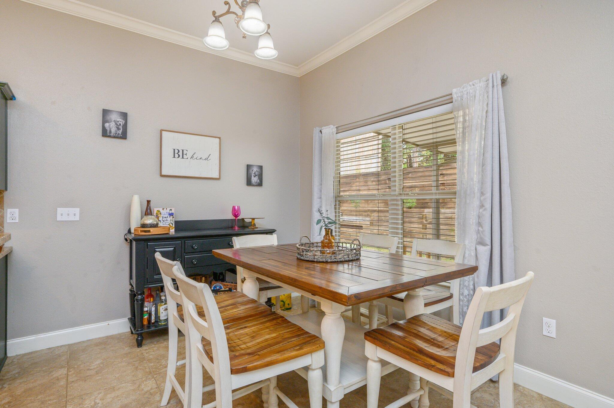 4545 Hermosa Road Crestview, FL 32539 - Photo 11 of 36 a view of a dining room with furniture window and outside view