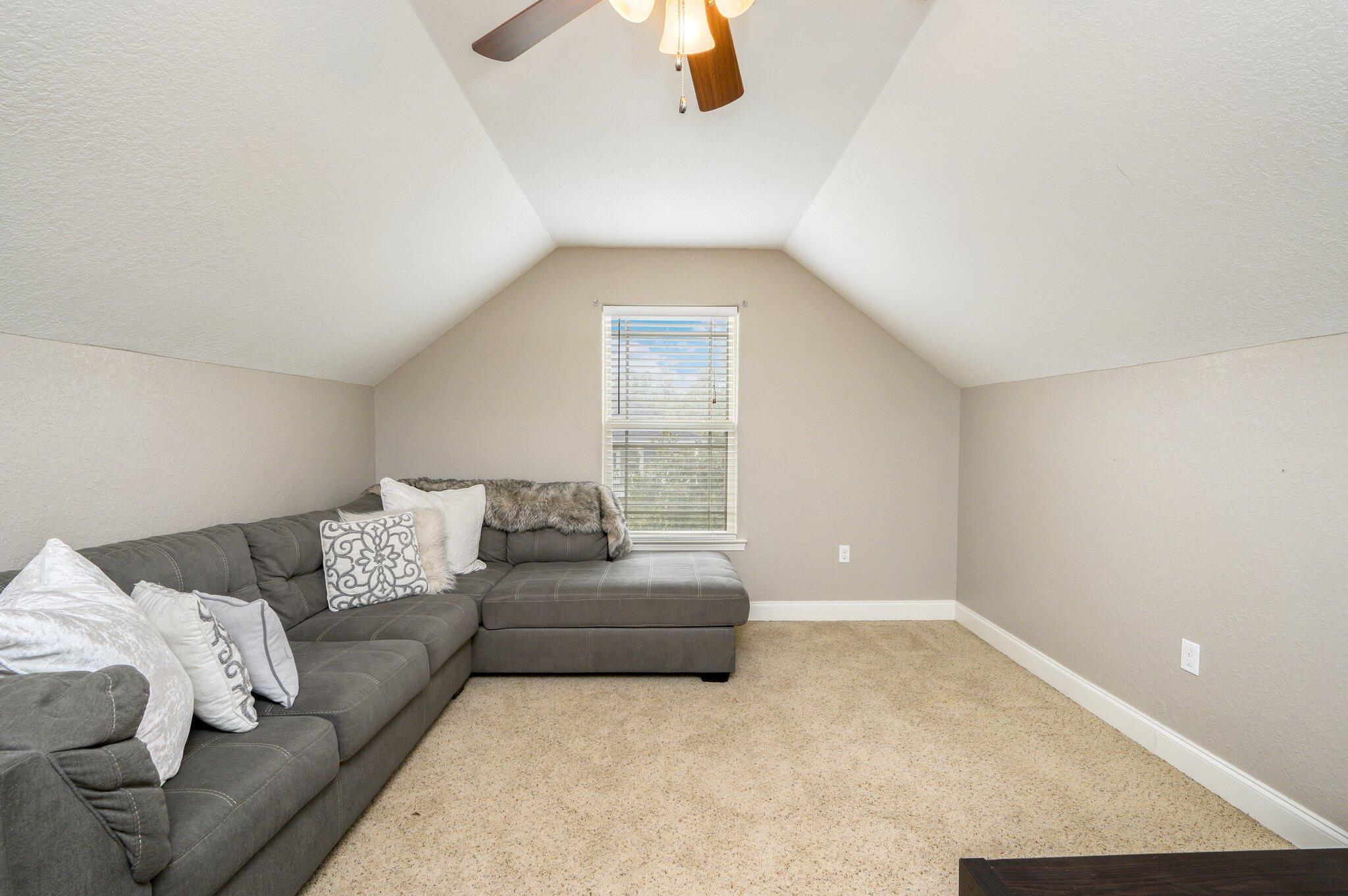 4545 Hermosa Road Crestview, FL 32539 - Photo 27 of 36 a living room with furniture and a window