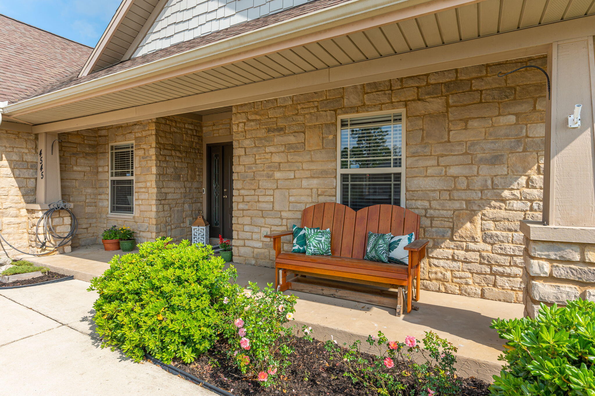 4545 Hermosa Road Crestview, FL 32539 - Photo 3 of 36 a view of a bench in front of house