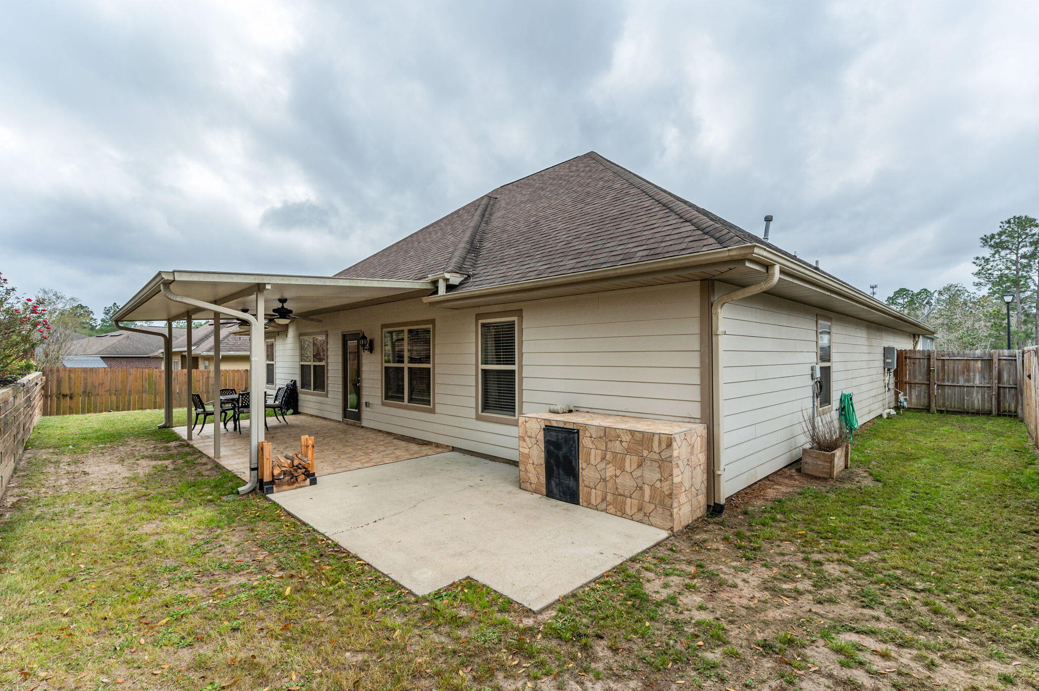 4545 Hermosa Road Crestview, FL 32539 - Photo 34 of 36 a view of a house with backyard