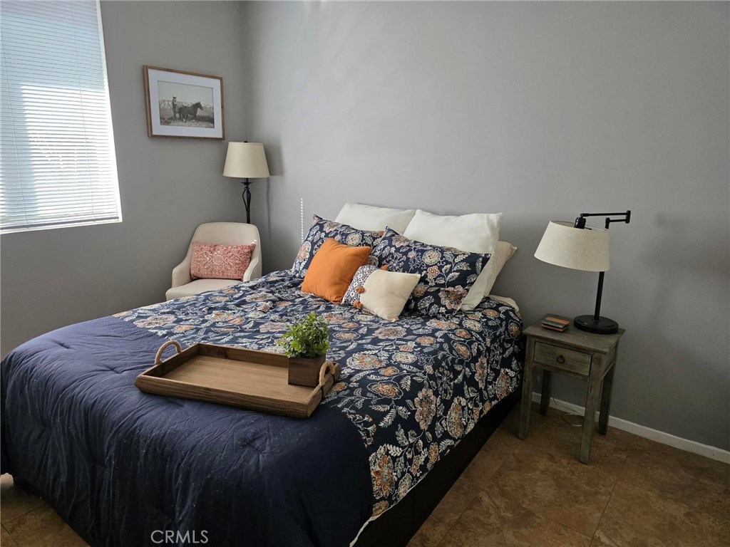 13491 Falcon Ridge Road Eastvale, CA 92880 - Photo 16 of 45 1st floor bedroom