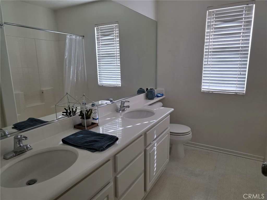 13491 Falcon Ridge Road Eastvale, CA 92880 - Photo 29 of 45 Hall bath