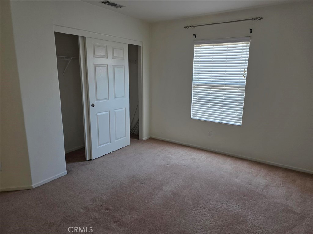 13491 Falcon Ridge Road Eastvale, CA 92880 - Photo 32 of 45 3rd upstairs bedroom