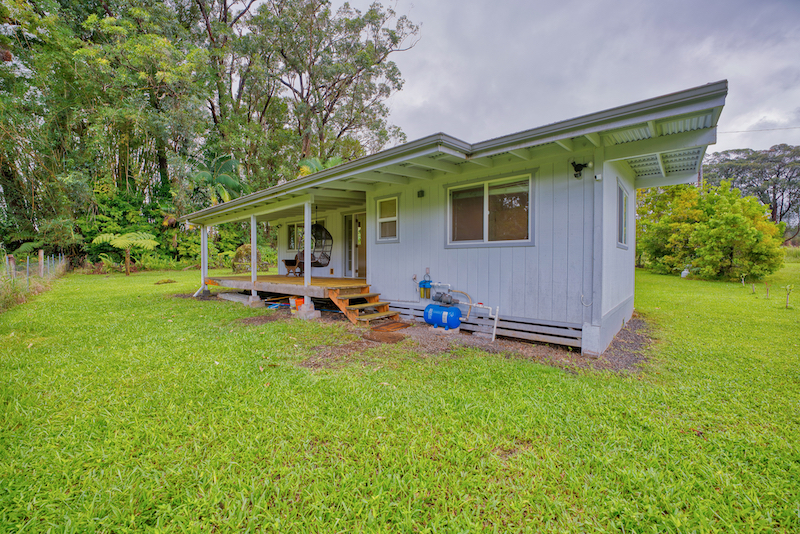 73 Canney Road Mountain View, HI 96771 - Photo 7 of 30 a view of a house with backyard and porch