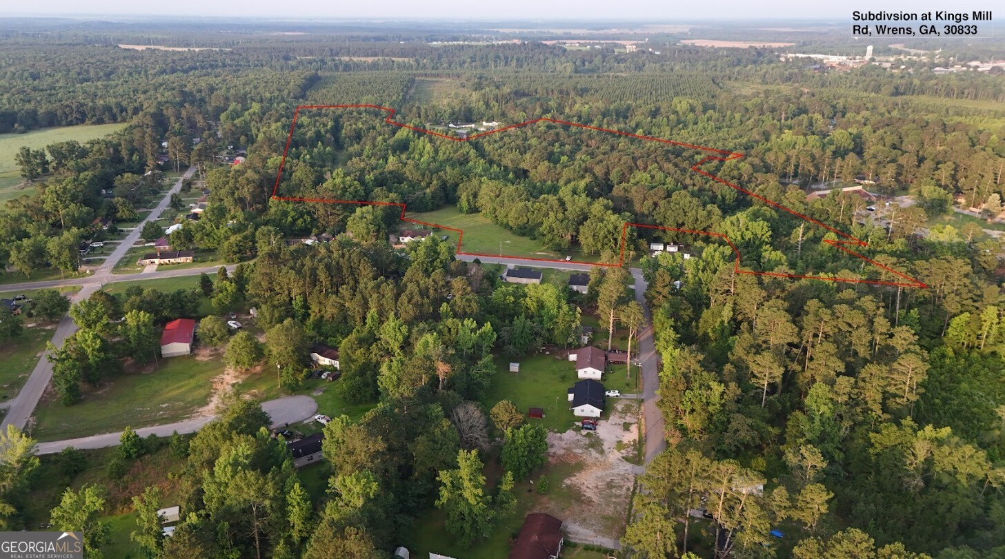 0 Kings Mill Road, Unit 4 Wrens, GA 30833 - Photo 18 of 23 an aerial view of residential house with outdoor space and trees all around