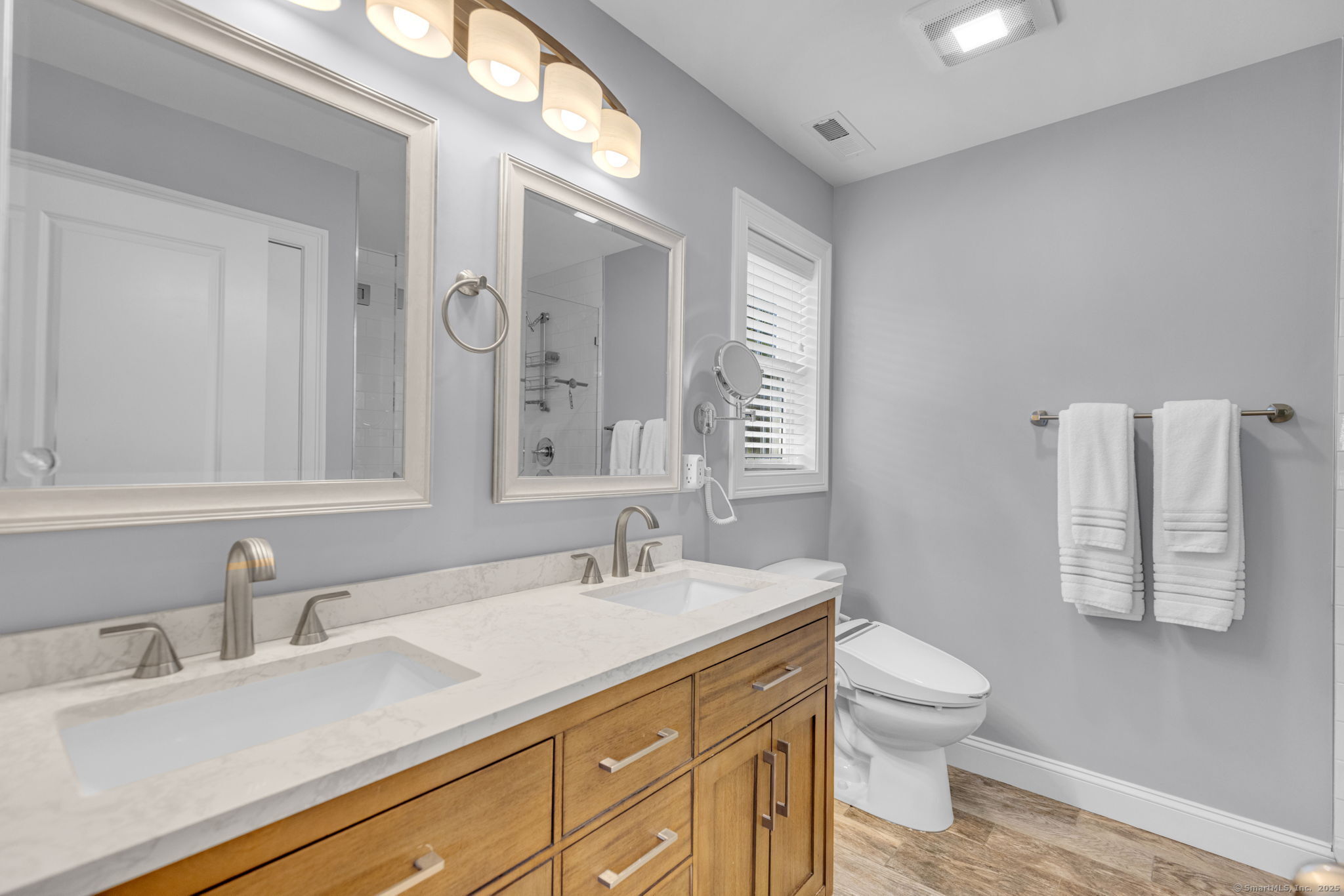 1209 Woodtick Road Wolcott, CT 06716 - Photo 18 of 40 a bathroom with a sink vanity granite and toilet