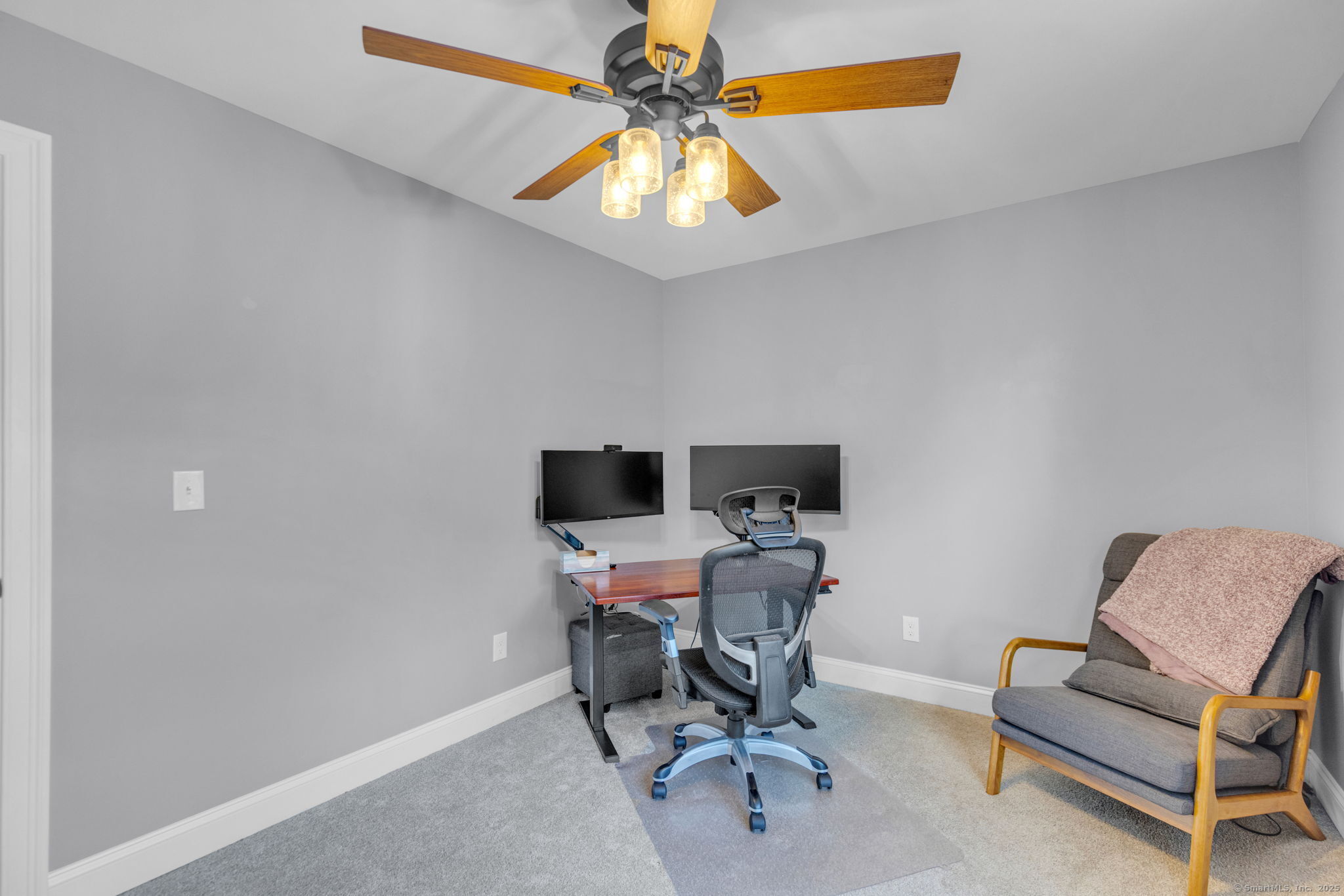 1209 Woodtick Road Wolcott, CT 06716 - Photo 23 of 40 a view of a workspace with a window and a chair