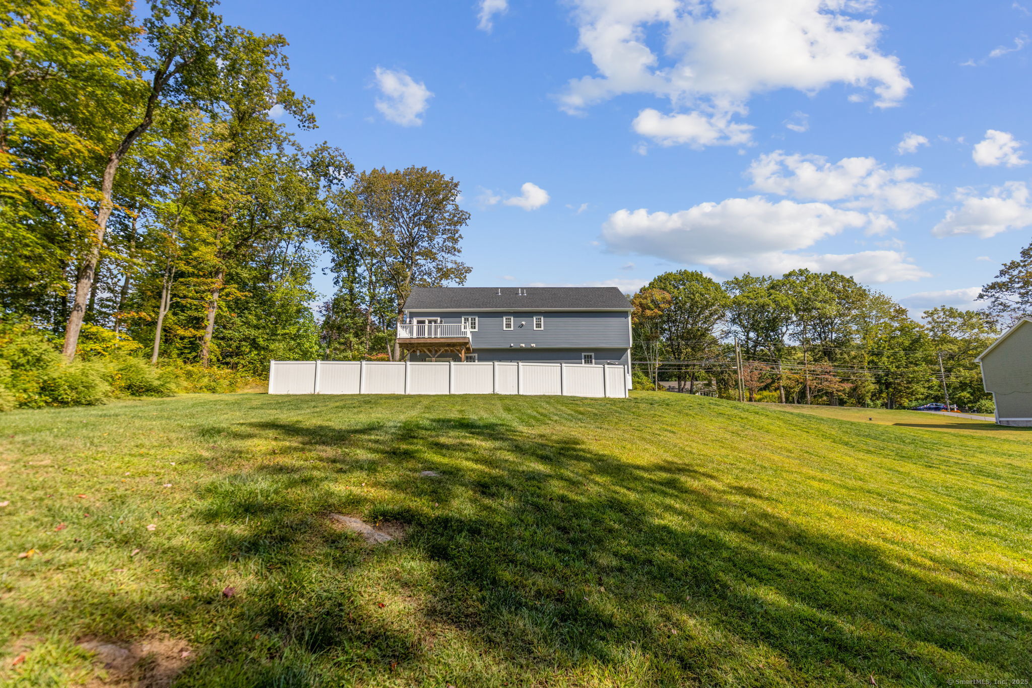 1209 Woodtick Road Wolcott, CT 06716 - Photo 28 of 40 a view of a house with a big yard
