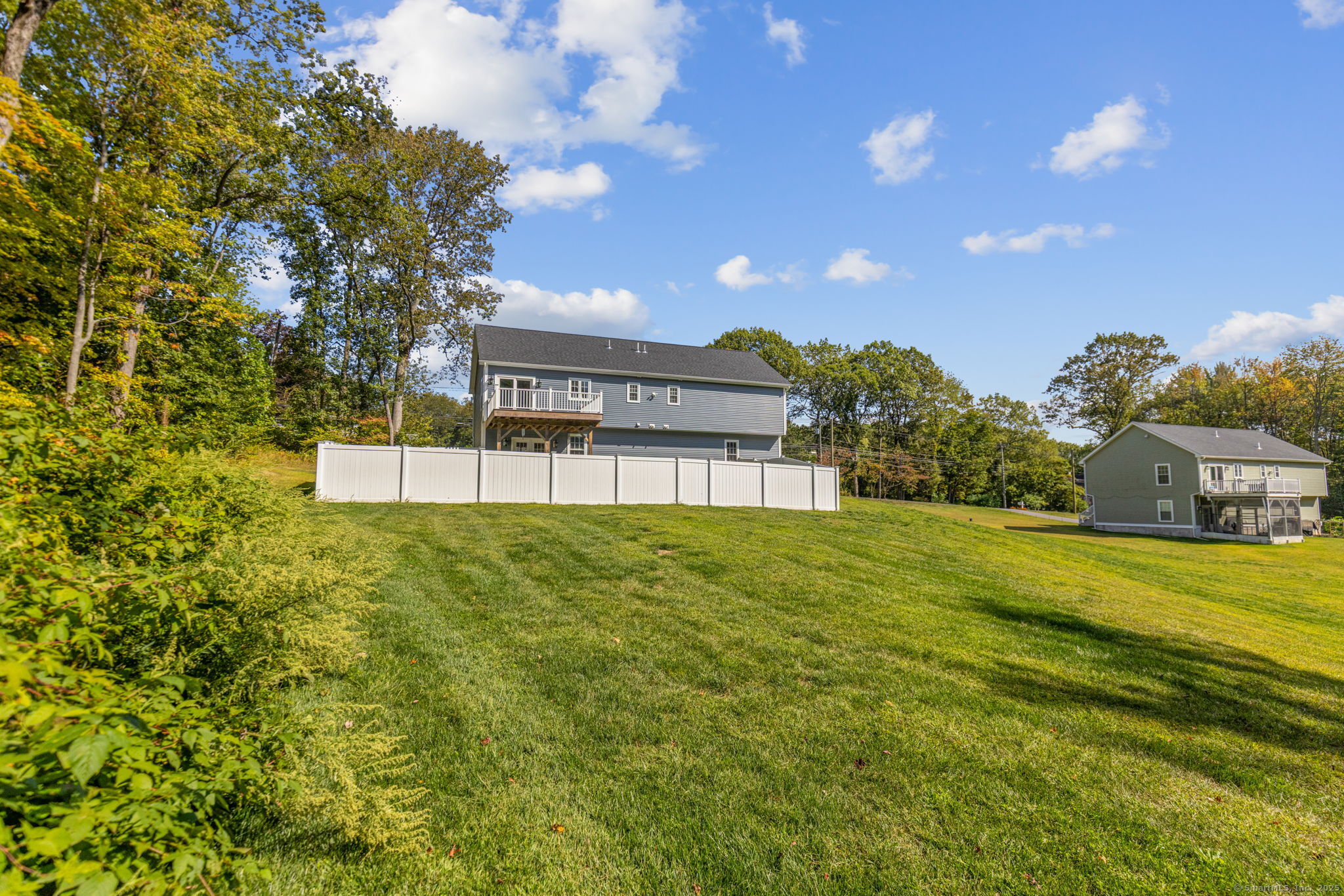 1209 Woodtick Road Wolcott, CT 06716 - Photo 29 of 40 a view of a house with a yard