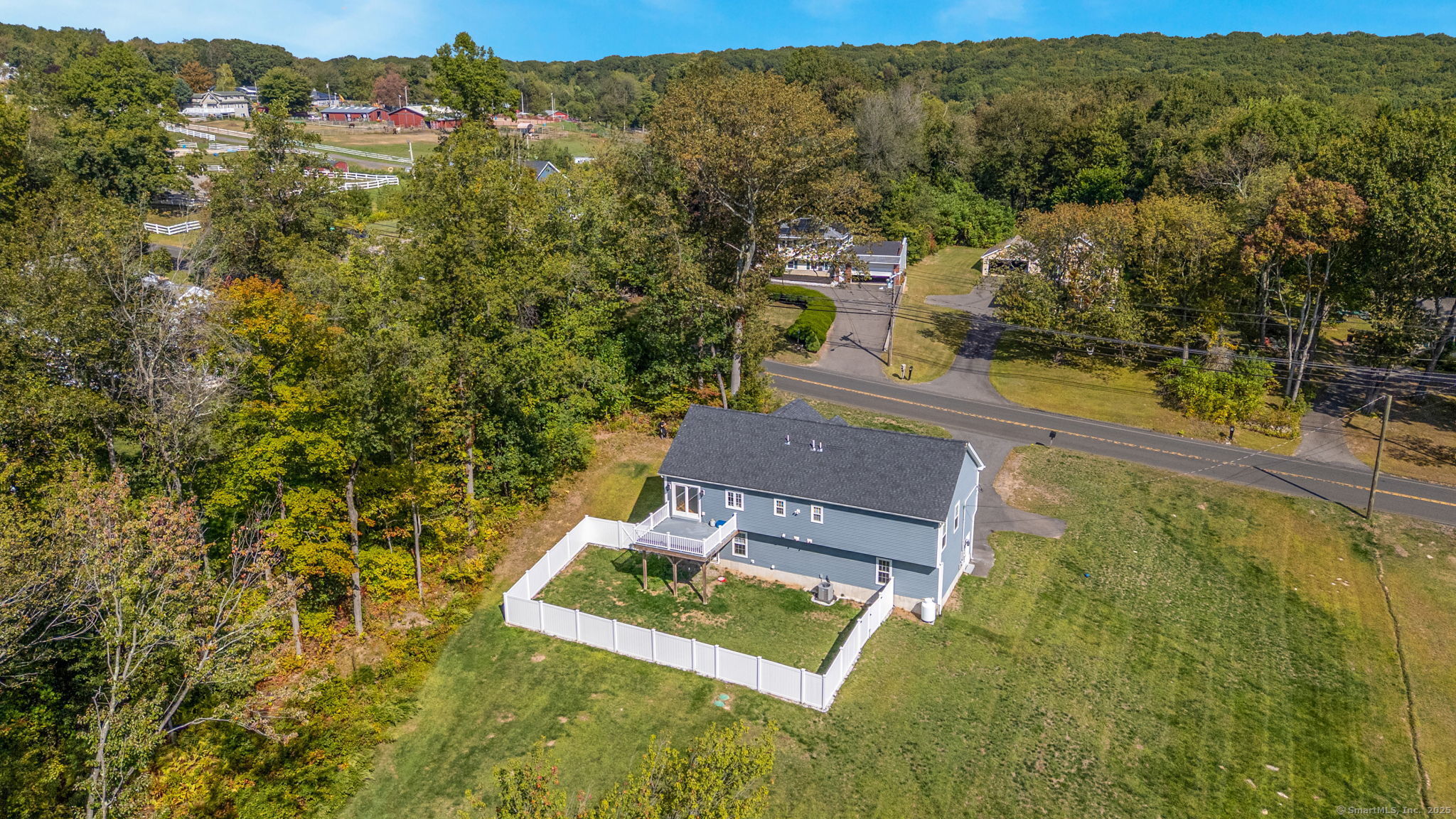 1209 Woodtick Road Wolcott, CT 06716 - Photo 36 of 40 an aerial view of residential houses with outdoor space