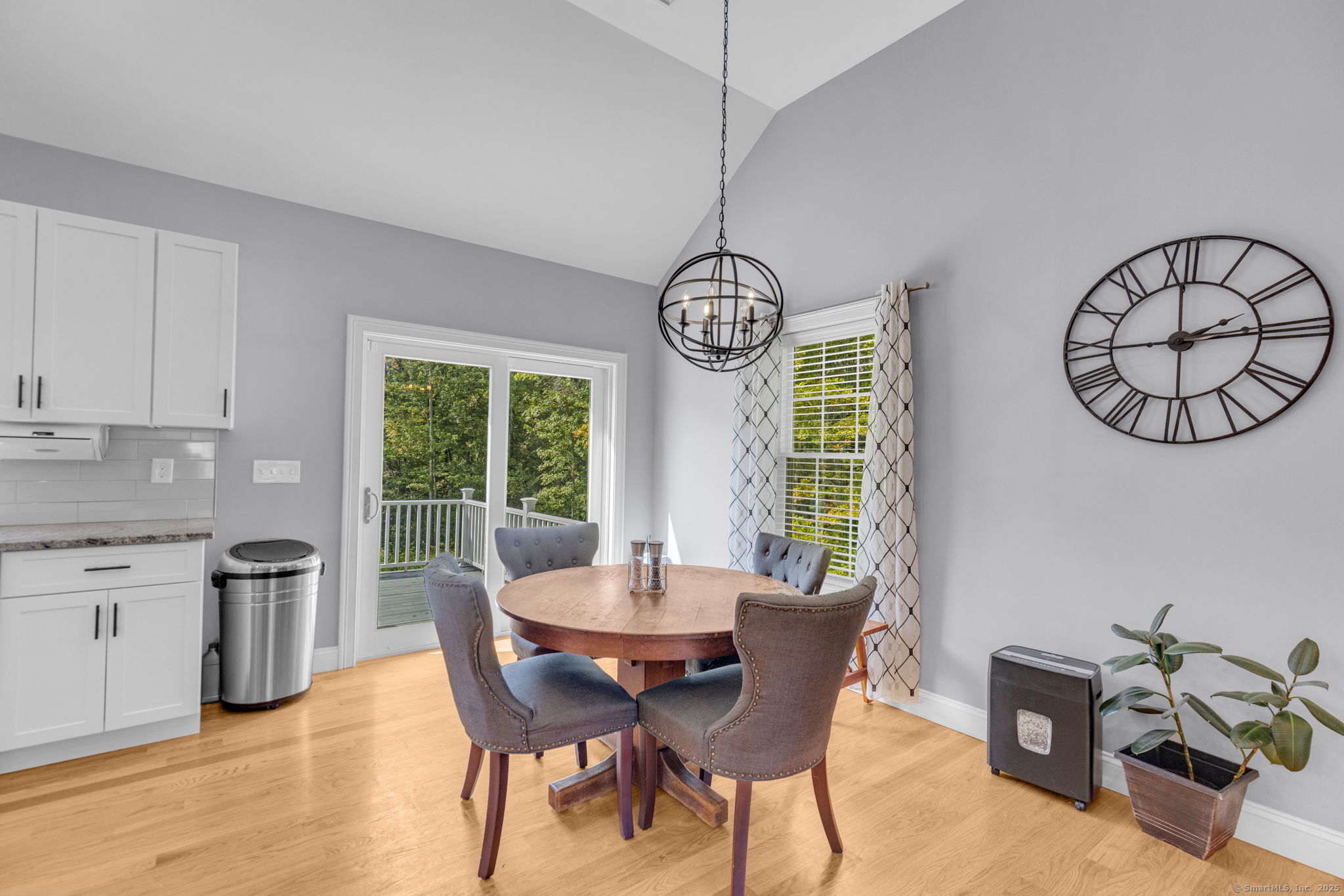 1209 Woodtick Road Wolcott, CT 06716 - Photo 7 of 40 a view of a dining room with furniture window and wooden floor