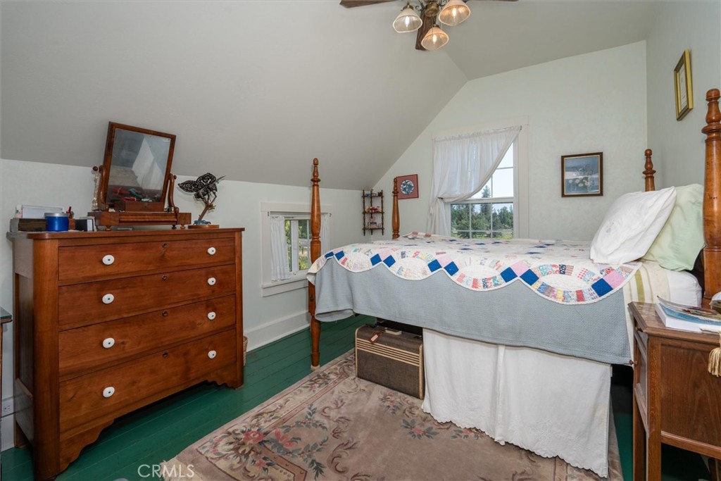 2669 Triangle Road Mariposa, CA 95338 - Photo 17 of 58 a bedroom with a bed and a dresser in it