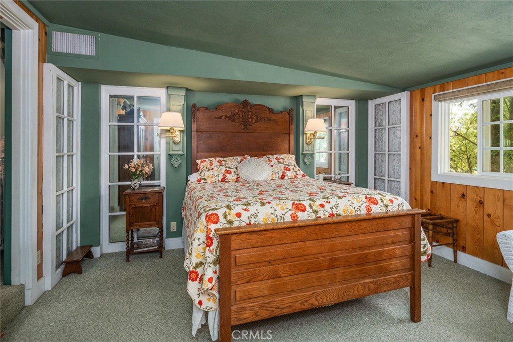 2669 Triangle Road Mariposa, CA 95338 - Photo 31 of 58 a bed sitting in a bedroom next to a window