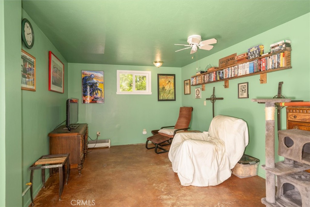 2669 Triangle Road Mariposa, CA 95338 - Photo 36 of 58 a living room with furniture and a chair