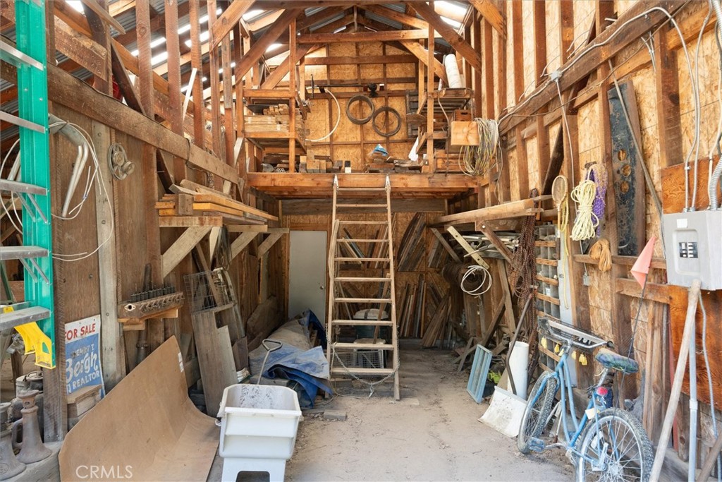 2669 Triangle Road Mariposa, CA 95338 - Photo 49 of 58 a view of walk in closet with clothes