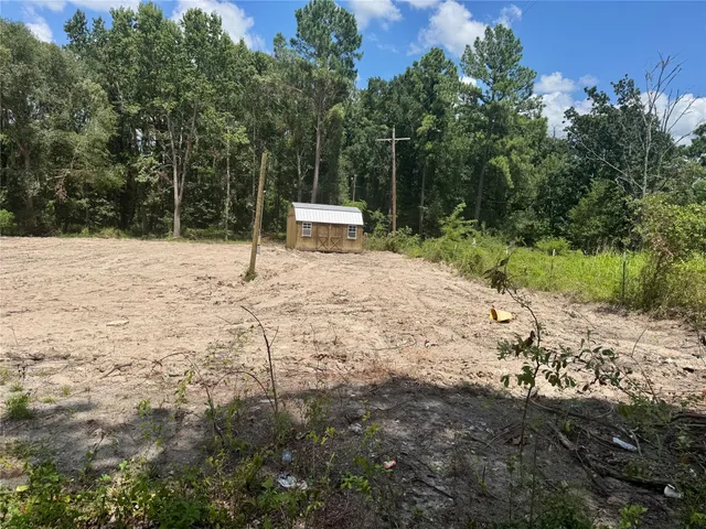 a white house covered with snow in the background