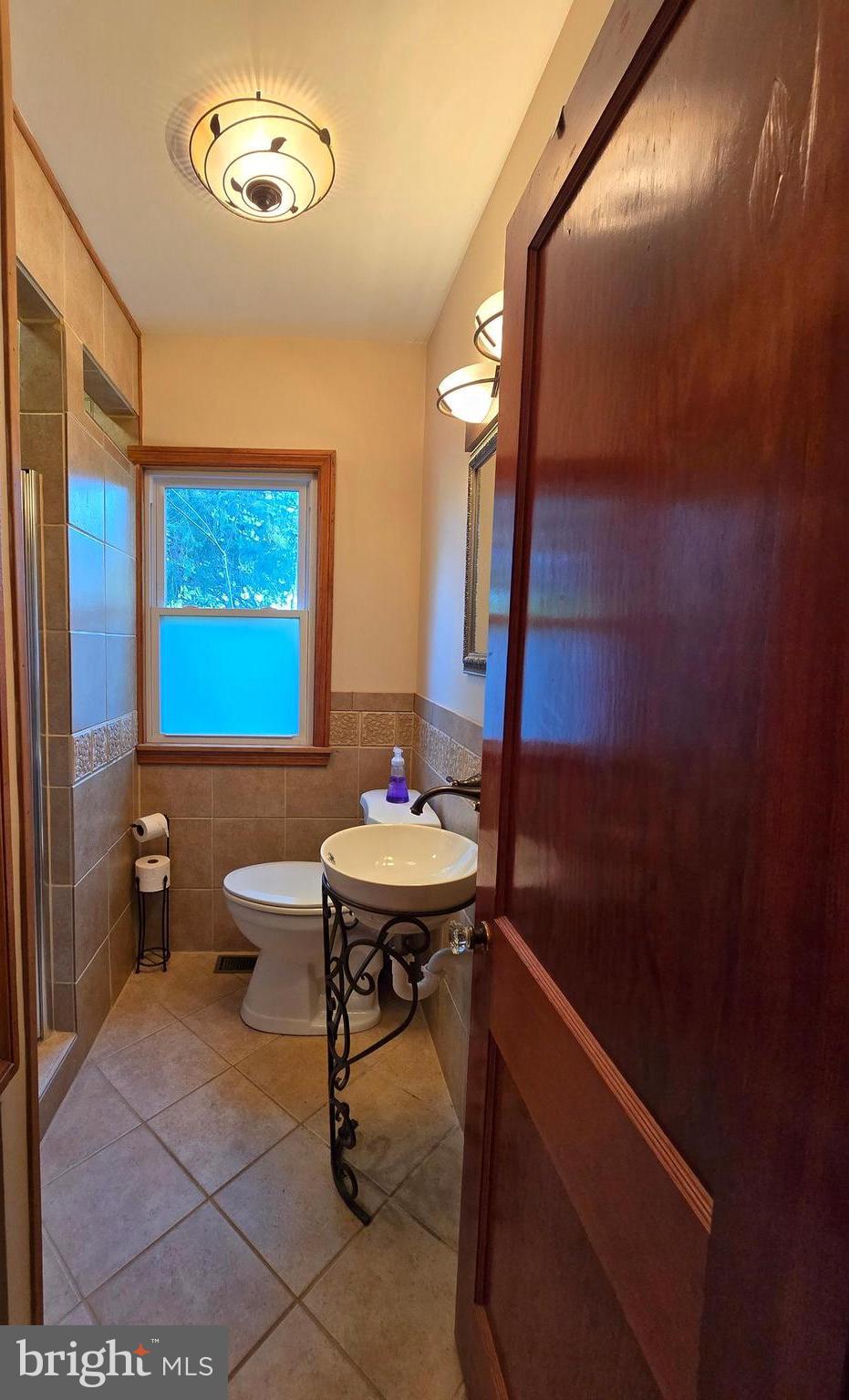 1945 Valley Road Berkeley Springs, WV 25411 - Photo 24 of 60 Main level bathroom