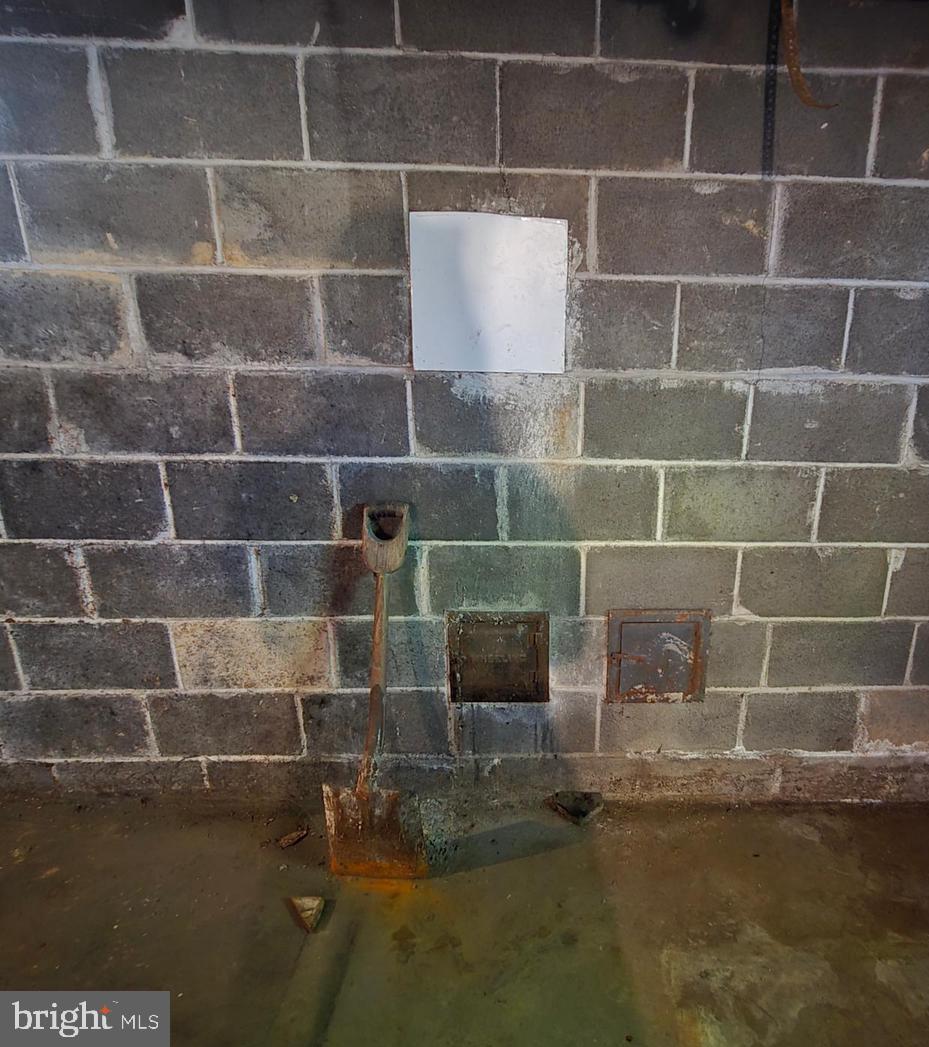 1945 Valley Road Berkeley Springs, WV 25411 - Photo 43 of 60 Flue for woodstove in basement
