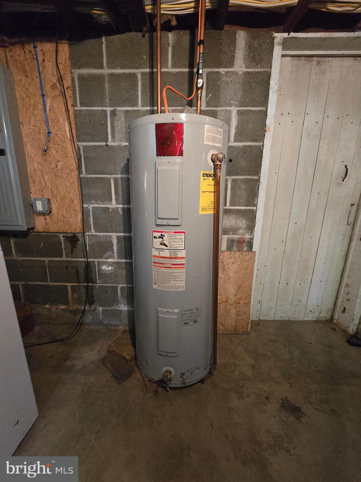 1945 Valley Road Berkeley Springs, WV 25411 - Photo 45 of 60 Water heater in basement